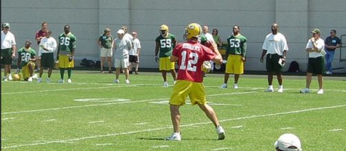Aaron Rodgers set a NFL record for most passes without an interception. [Image Source: Flickr | Dustin Filippini]