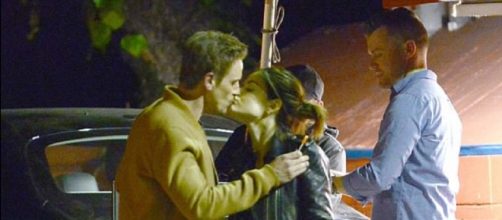 Lucy Hale and Riley Smith sharing a Valentine's kiss. (Image via Mega/Youtube screencap)
