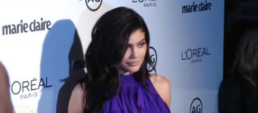Kylie Jenner gives birth to first child. [image source: ET/YouTube screenshot]