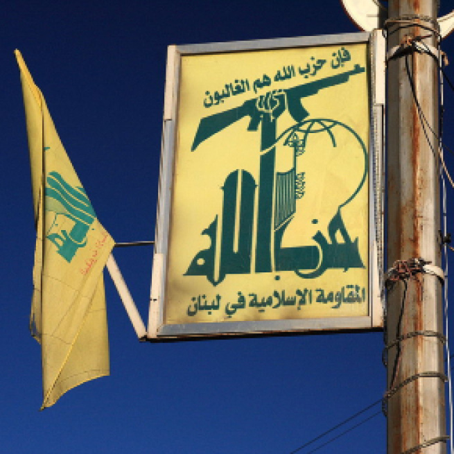 Hezbollah flag in Baalbek, Lebanon (Image via yeowatzup - Wikipedia)