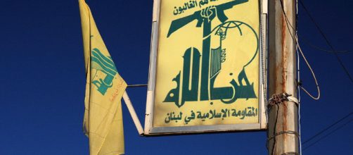 Hezbollah flag in Baalbek, Lebanon (Image via yeowatzup - Wikipedia)