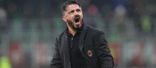 Gattuso esulta a San Siro sulla panchina del Milan