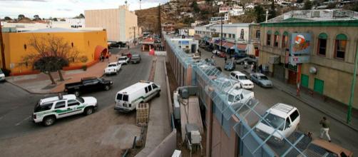 Mexican-American border at Nogales (Image credit - Gordon Hyde, Wikimedia Commons)