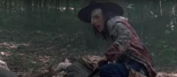 Carl gets bit on 'The Walking Dead' / Image via Eduardo Tocco, YouTube screencap Carl gets bit on 'The Walking Dead' / Image via Eduardo Tocco, YouTube screencap