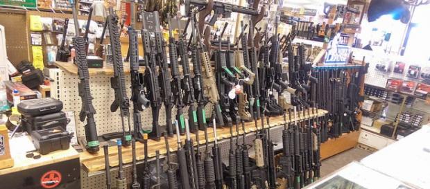 Assault rifles, mostly AR-15's, in a shop in Salt Lake City, Utah (Image credit – Michael McConville, Wikimedia Commons) Assault rifles, mostly AR-15's, in a shop in Salt Lake City, Utah (Image credit – Michael McConville, Wikimedia Commons)