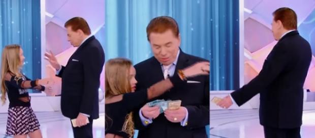 Menina tenta abraçar Silvio Santos, mas não é correspondida Menina tenta abraçar Silvio Santos, mas não é correspondida