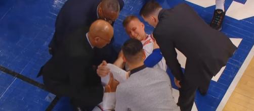 Kristaps Porzingis suffers an ACL injury. - [CliveNBAParody / YouTube screencap]