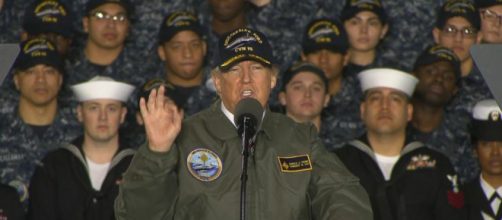 Trump touts plans to bolster military aboard new aircraft carrier ... - go.com