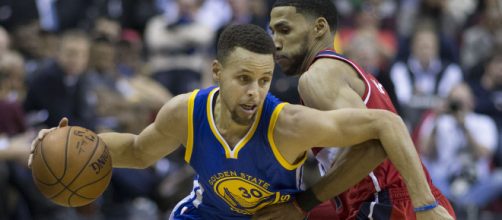 Stephen Curry takes shot at Cavs [Image by Keith Allison / Flickr]