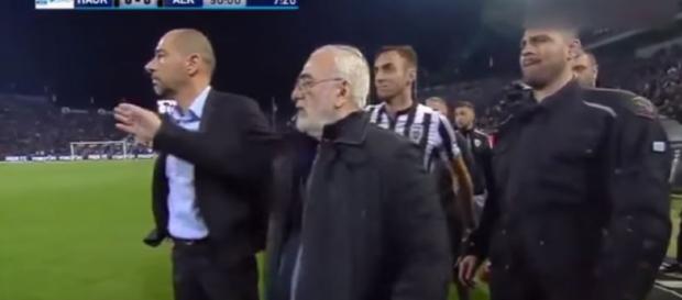 PAOK President enters the field with a gun, after referee cancels a goal for his team - image source - Bruno S. | YouTube PAOK President enters the field with a gun, after referee cancels a goal for his team - image source - Bruno S. | YouTube