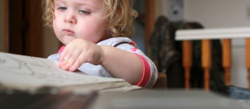 Taking portraits of your own kids can make a great project to keep your creaitivity alive. Photo by Carrie Sunday (Own work)