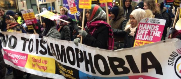 A photo from Glasgow's anti-racism march of Scottish Muslims holding a 'No To Islamophobia' Sign. Photo Credit: www.standuptoracism.org.uk A photo from Glasgow's anti-racism march of Scottish Muslims holding a 'No To Islamophobia' Sign. Photo Credit: www.standuptoracism.org.uk