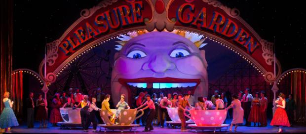 A scene from Mozart’s ‘Così fan tutte,’ set in 1950s Coney Island. Photo: Marty Sohl, courtesy of Metropolitan Opera, used with permission. A scene from Mozart’s ‘Così fan tutte,’ set in 1950s Coney Island. Photo: Marty Sohl, courtesy of Metropolitan Opera, used with permission.