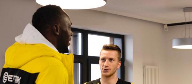 Usaint Bolt y Reus después del entrenamiento Usaint Bolt y Reus después del entrenamiento