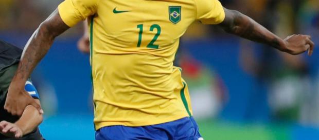 O atleta foi campeão olímpico pela seleção O atleta foi campeão olímpico pela seleção