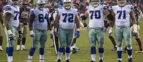 Dallas Cowboys salary cap implications for new free agent o-line additions [Image by Keith Allison / Flickr]