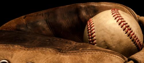 A ball in a glove [Image by Snapmann / Flickr]