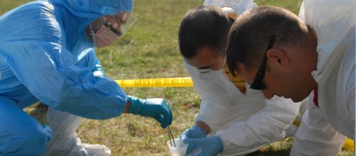 Mock crime scene being investigated (Image via US Army Europe - Flickr)