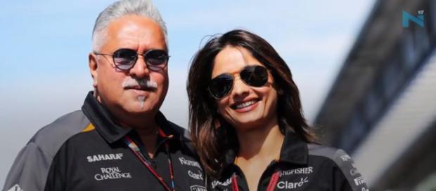 Vijay Mallya and Pinki likely to marry. Phot -( Image credit-Nyoooz TV-Youtube.com) Vijay Mallya and Pinki likely to marry. Phot -( Image credit-Nyoooz TV-Youtube.com)