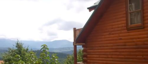 The Smoky Mountains offer a peaceful view. [image source Cabin Fever Vacations/YouTube screenshot]