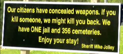 A welcome sign to Georgia's Harris County has gone viral. [image via Harris County Sheriff's Dept.]