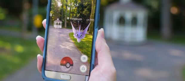 Person playing 'Pokemon GO' -- Penn State/Flickr Person playing 'Pokemon GO' -- Penn State/Flickr
