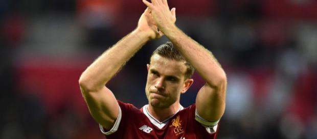 Jordan Henderson celebra con Jurgen Klopp Jordan Henderson celebra con Jurgen Klopp