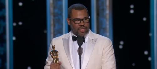 Jordan Peele delivering his acceptance speech in the 2018 Oscars. [Image via ABC Television Network/YouTube screencap]
