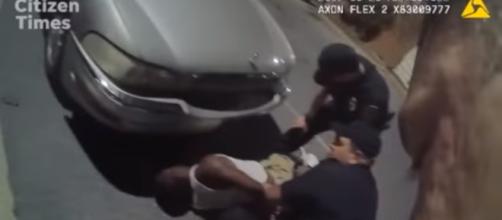 Video of police officers using excessive force. (Image Credit: TLE TV/Youtube)