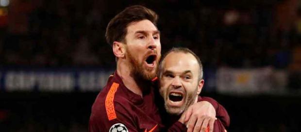 Leo Messi está protegendo Andres Iniesta Leo Messi está protegendo Andres Iniesta