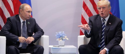 In alto, un'immagine del presidente Putin e di Donald Trump.