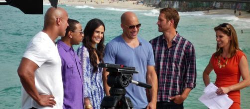 Dwayne Johnson with others in Rio de Janeiro, Brazil (Image Credit: Jack Zalium, Wikimedia Commons)