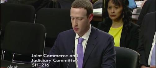 The Facebook owner faced off with American lawmakers. - [Image via CNET / YouTube screencap]