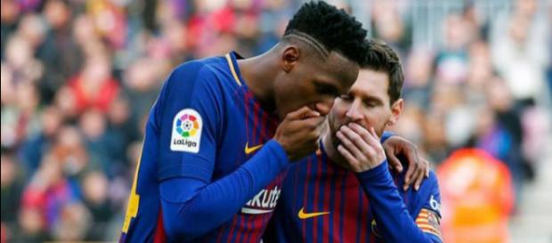 Yerry Mina com Leo Messi, no Barcelona Yerry Mina com Leo Messi, no Barcelona
