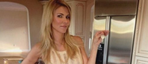 Brandi Glanville poses in her new home. [Photo via Instagram]