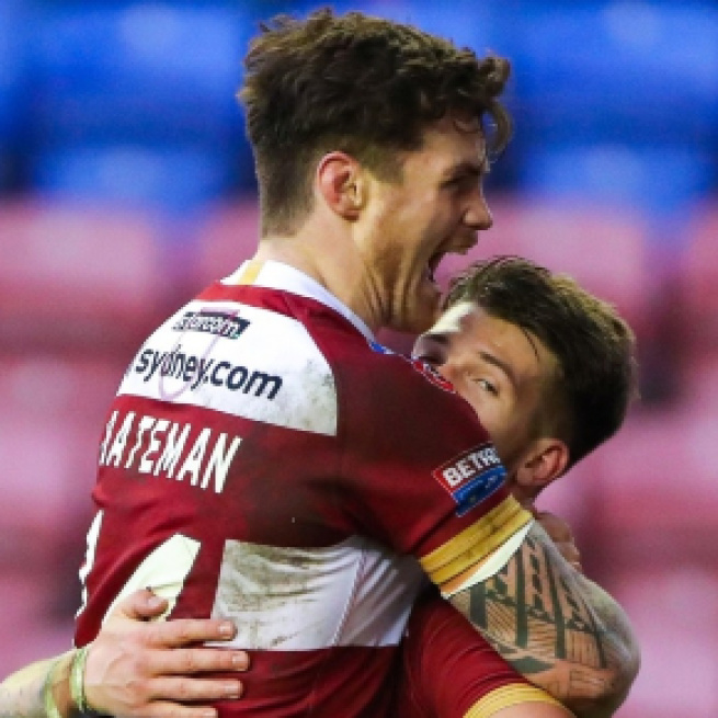 Joel Bateman embraces Oliver Gildart after the latter's try on Friday night. Image Source - rugby-league.com