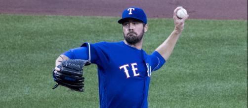 Cole Hamels of the Texas Rangers could be targeted by the New York Yankees later in the season. - [Image Via Keith Allison, Flickr]