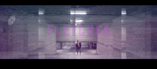 Cari Fletcher, publicly known as Fletcher, in her music video for 'Wasted Youth.' [image source: FLETCHER/YouTube]