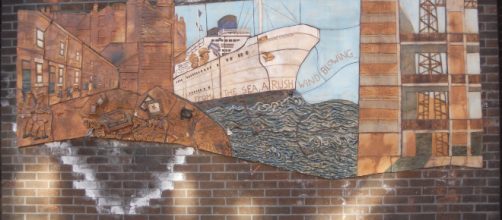Hulme Library mural detail War and Empire Windrush Photo by Ceropegius via Wikimedia