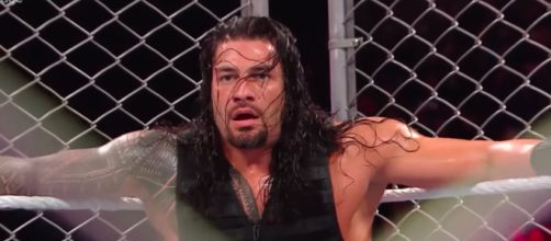 Roman Reigns will battle Brock Lesnar for the WWE Universal title inside a steel cage on Friday. [Image via WWE/YouTube]