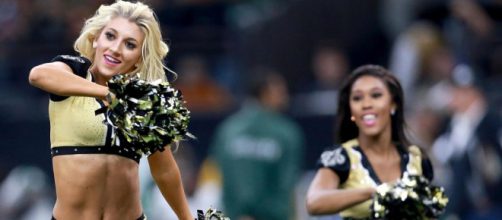 All is not well in the NFL cheerleading world. [Image via Maxim/YouTube]