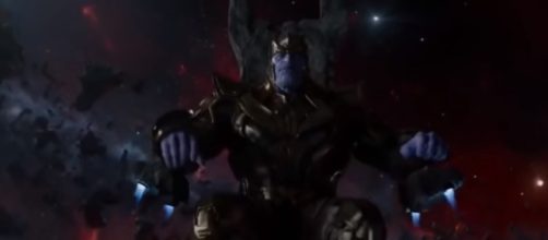 Thanos sits on his throne while taling to Ronan the Accuser. [Image via Mald3x/YouTube screencap]