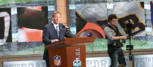 NFL Commissioner Roger Goodell at the podium for the annual NFL Draft. [Image via Flickr/Wikimedia Commons]