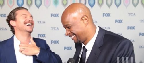 Crawford and Wayans of 'Lethal Weapon' laughing during interview. - [Image source: HipHollywood -- YouTube Screenshot]