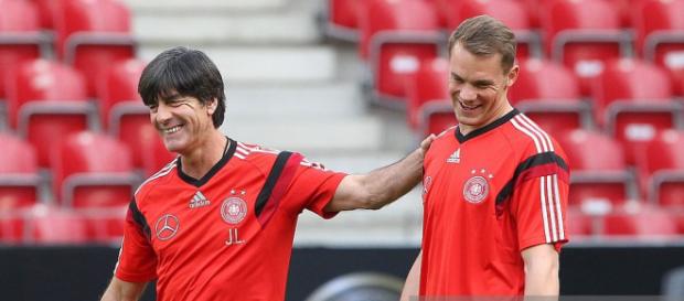 Germany's head coach Joachim Loew (L) and goalkeeper Manuel Neuer ... - gettyimages.com Germany's head coach Joachim Loew (L) and goalkeeper Manuel Neuer ... - gettyimages.com