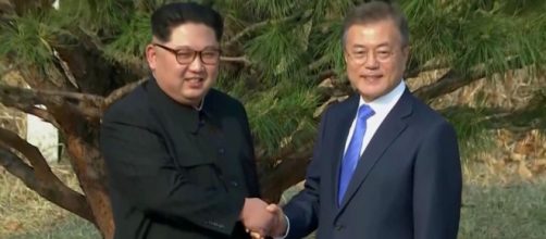 South Korean President Moon Jae-in and North Korean leader Kim Jong-un are making history. [Image via Sky News/YouTube]