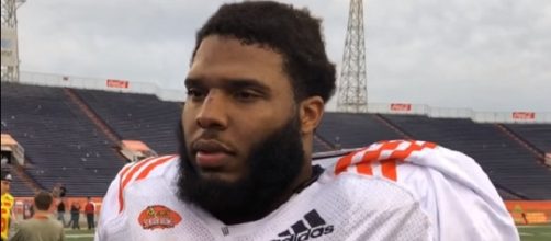 The 6-foot-3 Isaiah Wynn was a team captain with the Bulldogs (Image Credit: Atlanta Journal-Constitution/YouTube)