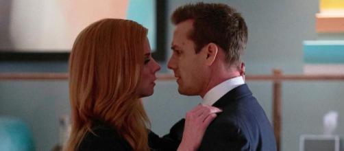 Suits season 7 Donna and Harvey kiss {Image via Instagram/suits_usa}