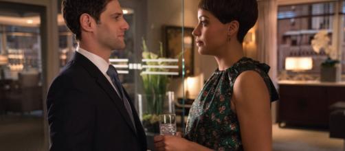 A pregnant Lucca chats with ex-lover at her work party.- [ Image via Twitter / The Good Fight]