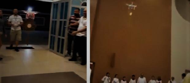 Due fermo immagine tratte dal video: JESUS SACRAMENTADO LEVADO POR UM DRONE https://www.youtube.com/watch?time_continue=5&v=TJ64uAoQjrs Due fermo immagine tratte dal video: JESUS SACRAMENTADO LEVADO POR UM DRONE https://www.youtube.com/watch?time_continue=5&v=TJ64uAoQjrs